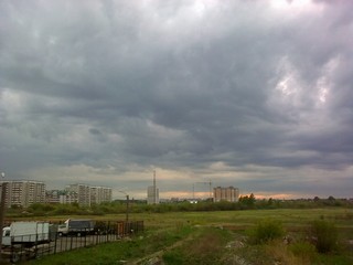 lead clouds over a city (viktor drobot)